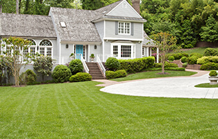 Green lawn in front of a lovely Virginia home